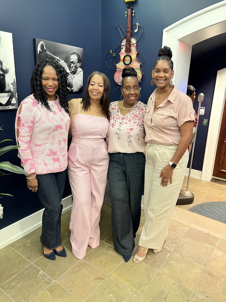 D.L. Augustine with friends at an author gathering